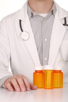 Male Doctor With Empty Orange Prescription Bottles