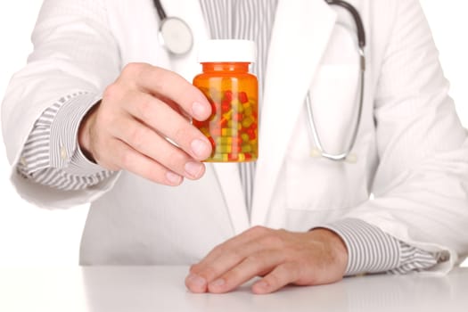 Handsome Doctor With Medication in Prescription Bottles