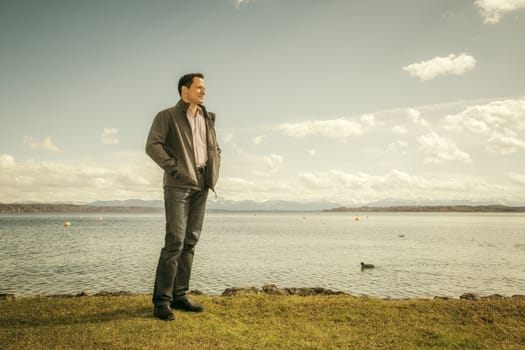 A man at the lake in autumn