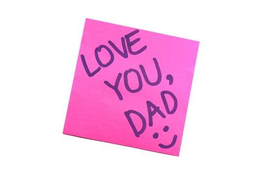 Sticky note with text "love you dad"