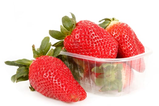 fresh strawberries in box on white background