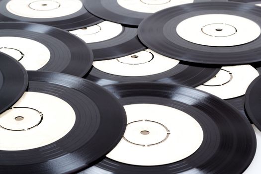 group of old small black vinyl records 
