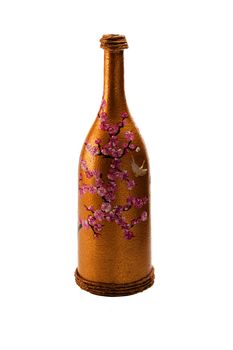 Painted bottle with cherry blossoms in high resolution