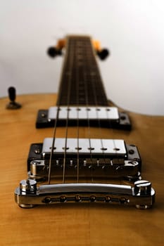 Parts of a yellow electric guitar in high resolution