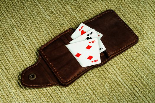 Purse made of leather and playing cards in high resolution