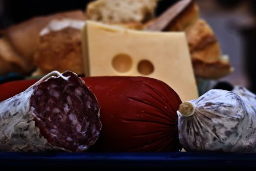 Sausage, mortadella, bread and cheese. italian appetizers