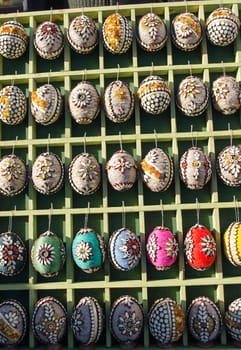 handmade easter eggs imitation decorations sold in outdoor spring market fair.