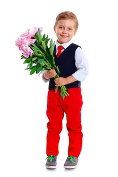 Happy schoolboy with flower. Isolated on white background
