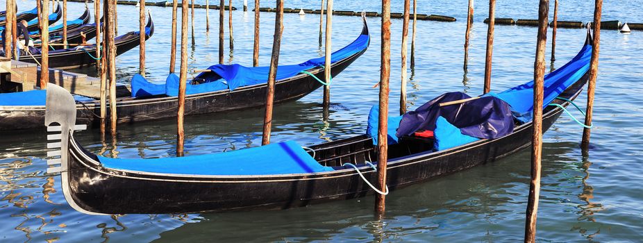 Panoramic view of gondolas in Venice, Grand Canal, Italy. 