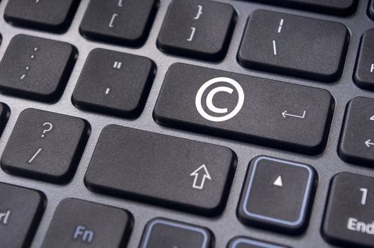 a copyright symbol on keyboard to illustrate the concepts.