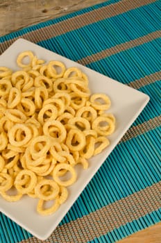 Portion of crunchy and salted corn rings