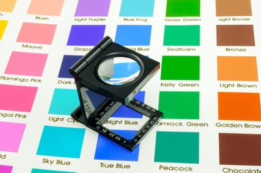 Magnifier loupe color management on color chart.