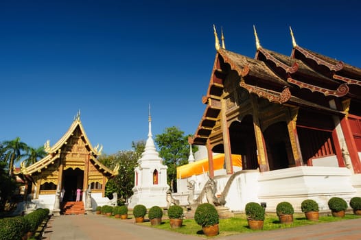 Phra Singh temple sunny day is located in the western part of the old city center of Chiang Mai, Thailand.