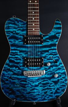 Gorgeous Blue Guitar with black background