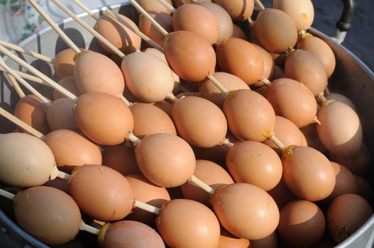 Grilled eggs at market, thailand