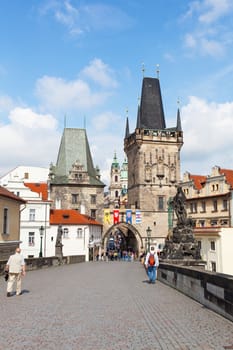 Tourists on Charles Bridge, June 11, 2012, Prague,Czech Republic. Annually Prague is visited by more than 3,5 million tourists.