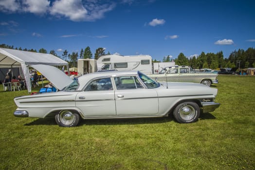 1962 Chrysler Newport. The image is shot by Dawn at the Farm in Halden, Norway.