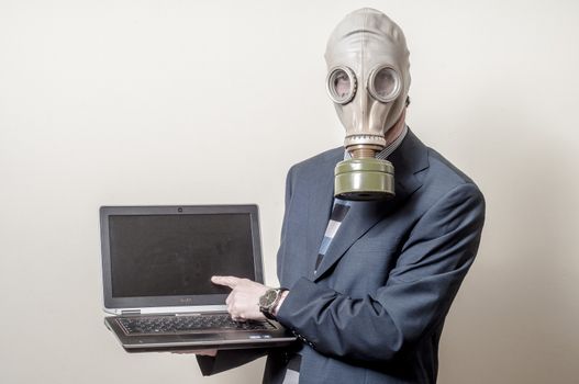 businessman with gas mask with notebook on gray background
