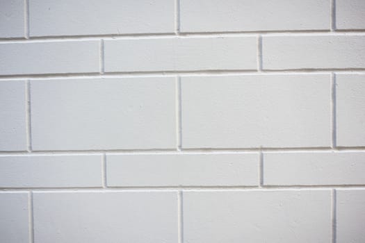 Detail brick wall of gray color close-up.