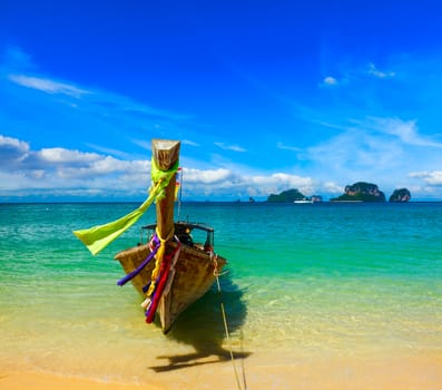 Long tail boat on tropical beach, Krabi, Thailand