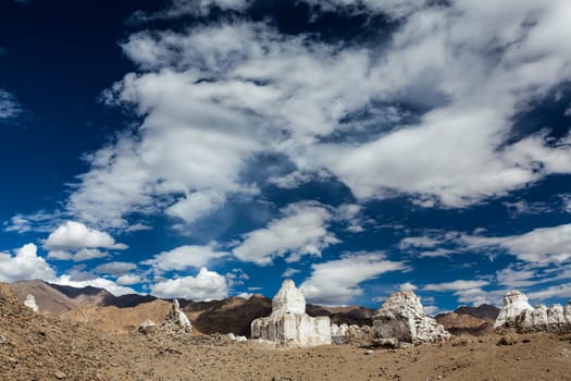 Whitewashed chortens (Tibetan Buddhist stupas). Ladakh, Jammu and Kashmir, India