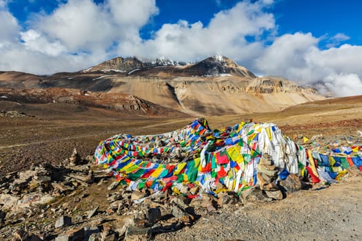 Buddhist prayer flags (lungta) on Baralacha La pass on Manali-Leh highway in Himalayas. Himachal Pradesh, India