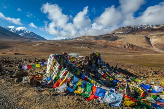 Buddhist prayer flags (lungta) on Baralacha La pass on Manali-Leh highway in Himalayas. Himachal Pradesh, India