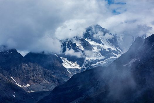 Severe HImalayas mountains in clouds. India