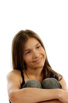 Attractive Long Hair Teen Sitting with Embracing your Legs and Smiling