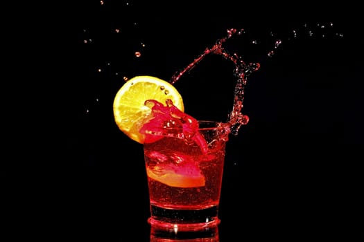 Red wine splash with a slice of orange
