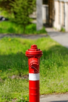 red fire hydrant on the sidewalk