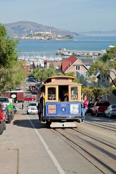 SAN FRANCISCO - NOVEMBER 2012: The Cable car tram, November 2nd, 2012 in San Francisco, USA. The San Francisco cable car system is world last permanently manually operated cable car system. Lines were established between 1873 and 1890.