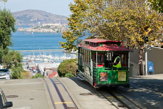 SAN FRANCISCO - NOVEMBER 2012: The Cable car tram, November 2nd, 2012 in San Francisco, USA. The San Francisco cable car system is world last permanently manually operated cable car system. Lines were established between 1873 and 1890.