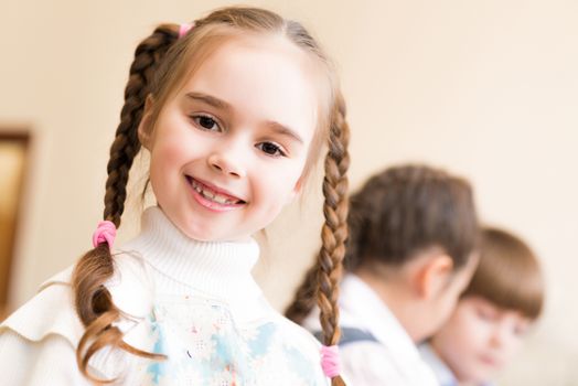 portrait of a girl in an apron, the kids involved in art school