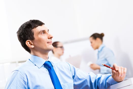 business woman doing a report next presentation boards, listening to her colleagues