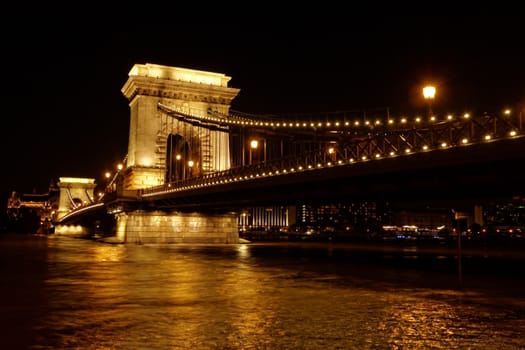 Night image with traffic of the hungarian chain Bridge extremly high donau