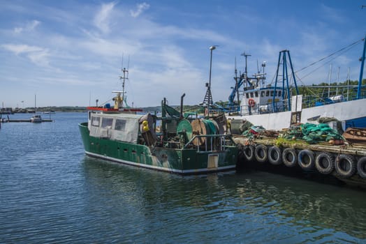 The fishing boats is moored to the docks in Grebbestad, Sweden.