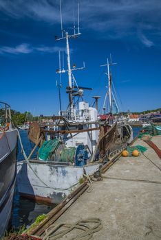 The fishing boats is moored to the docks in Grebbestad, Sweden.