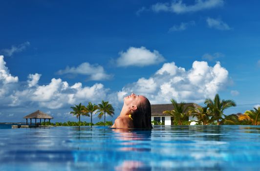 Woman at the swimming pool 