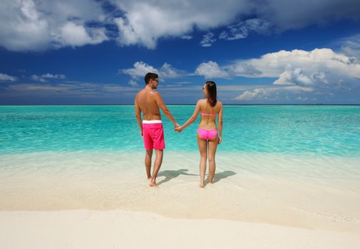 Couple on a tropical beach at Maldives