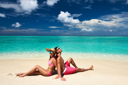 Couple on a tropical beach at Maldives