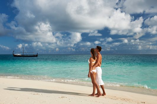 Couple on a tropical beach at Maldives