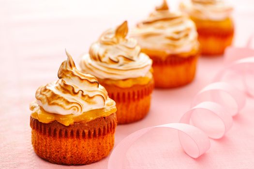 Cupcakes with whipped cream and icing