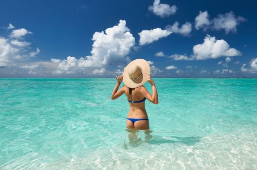 Woman in bikini at tropical beach