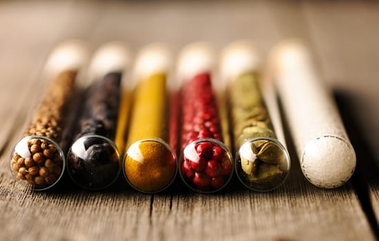 Spices in beakers close up