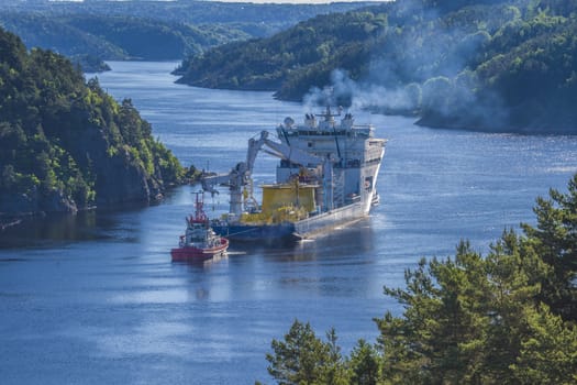 MV North Sea Giant are in the Ringdasfjord in Halden, Norway and waiting for two tugs that will tow the ship into open waters