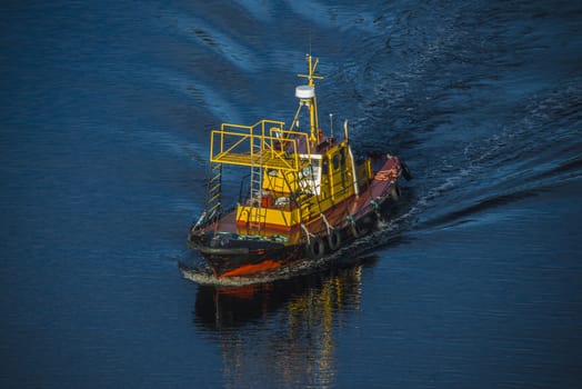 The boat check the water-depth in Ringdalsfjord in Halden, Norway to see if Mv North Sea Giant can be towed out to the open sea.