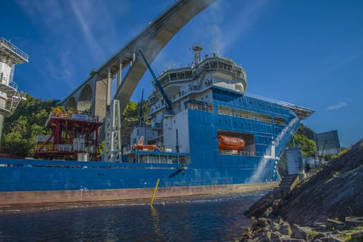 Tug Achilles and tug Belos have started towing the MV North Sea Giant through Ringdalsfjord in Halden, Norway.