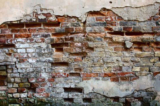 background texture from brick wall with cracked plaster