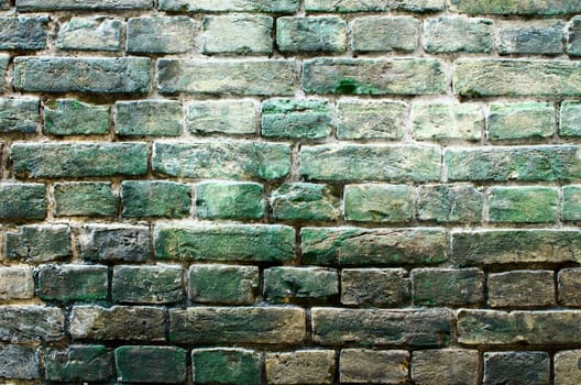 the walls are made of bricks of green